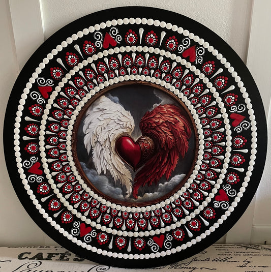 Handpainted red and white angel wings plaque on a 16 inch wood round