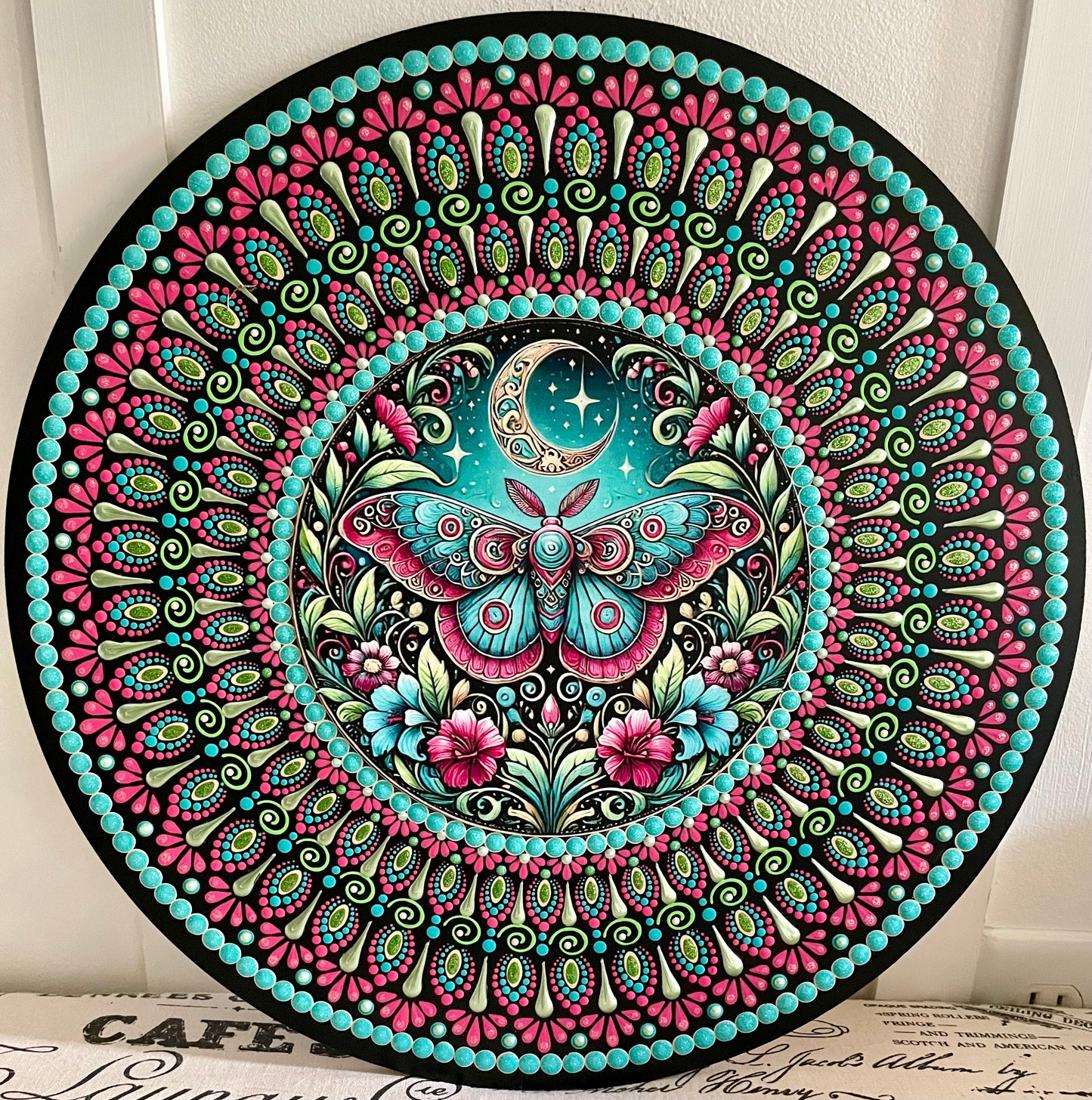Hand painted moth plaque on a 16 inch wood round