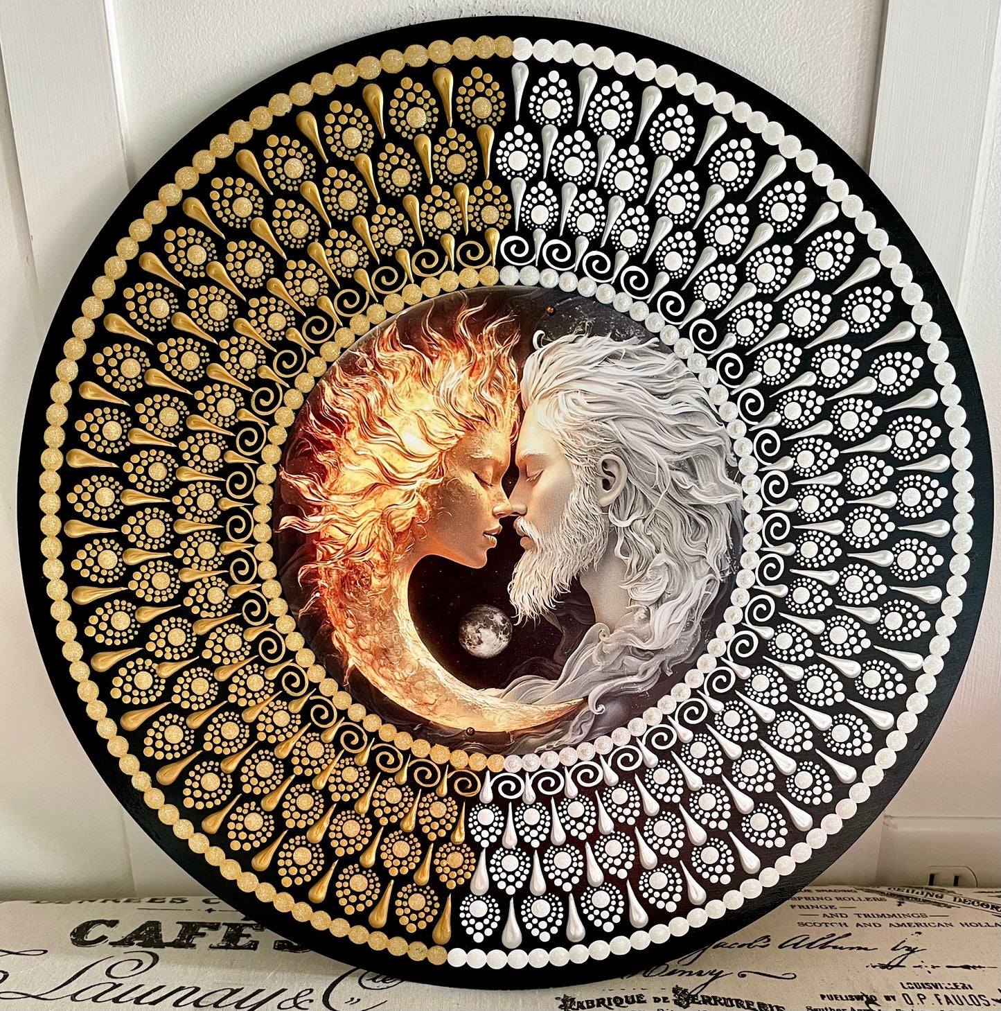 Hand painted sun and moon plaque on a 16 inch wood round 
