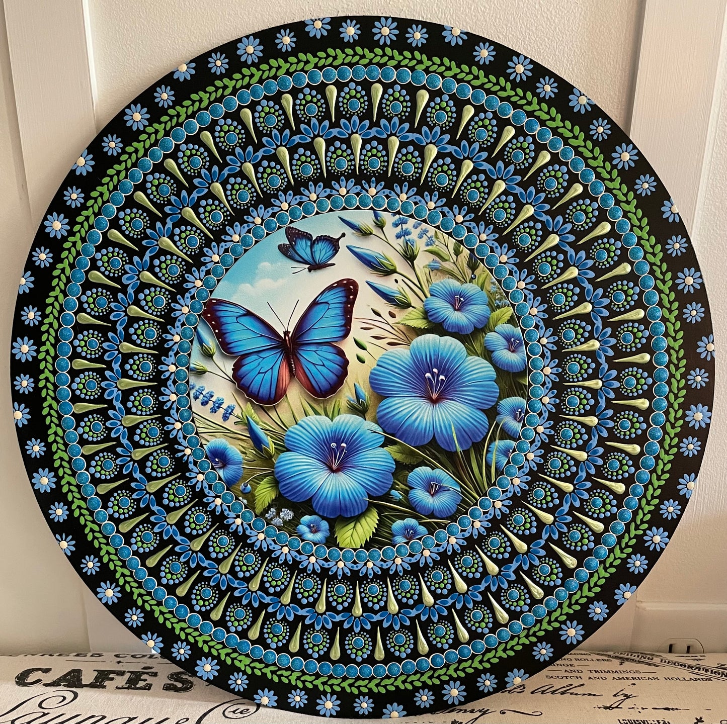 Handpainted butterfly plaque on a 16 inch wood round