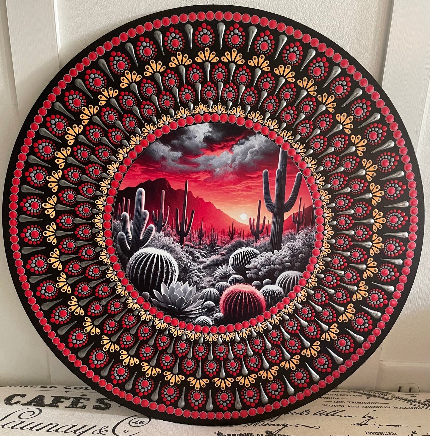 Hand painted cactus plaque on a 16 inch wood round.