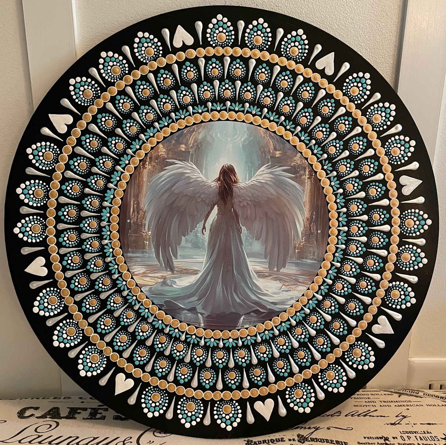 Handpainted angel plaque on a 16 inch wood round
