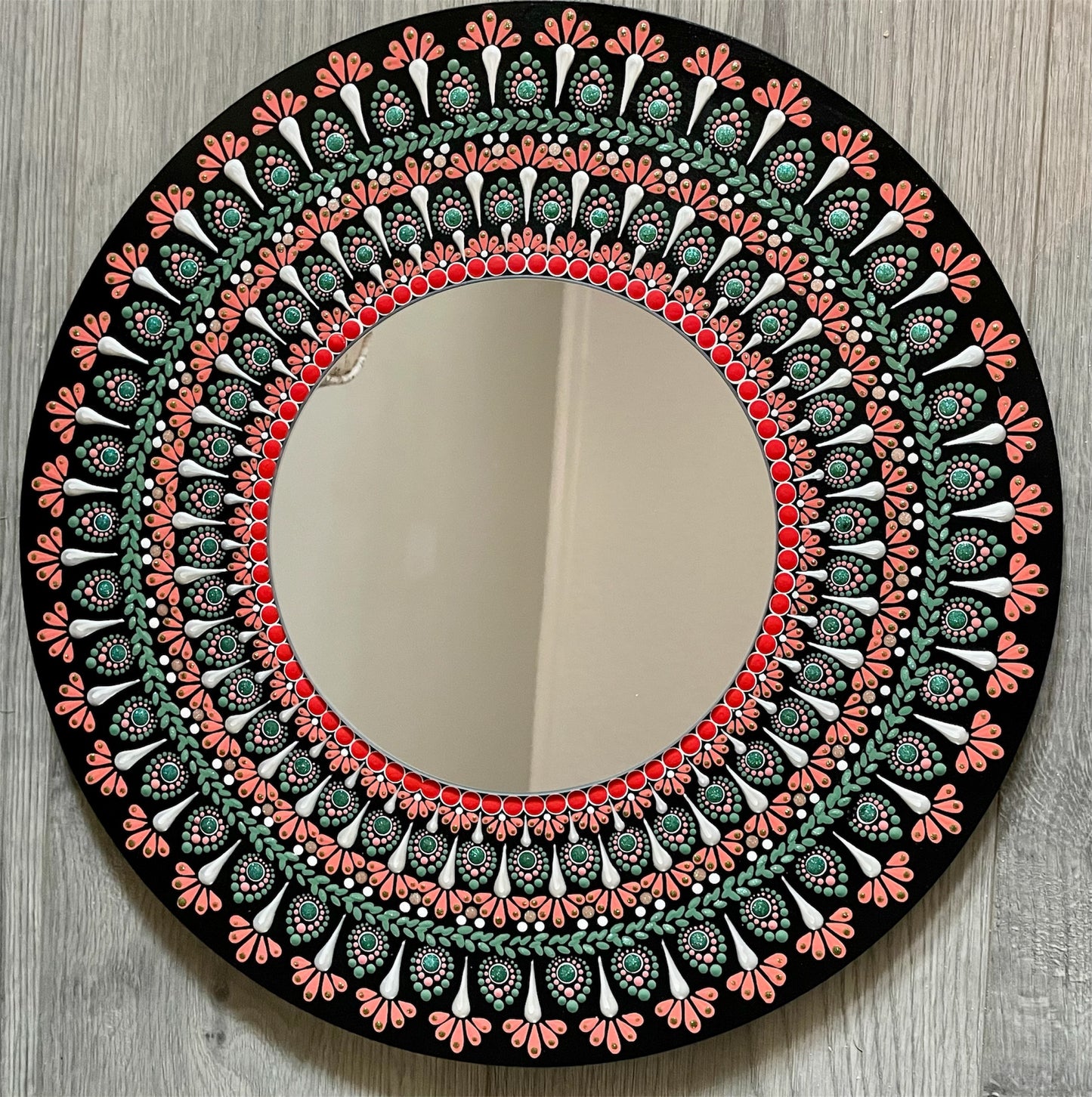 Hand painted 16 inch wood round with an 8 inch mirror in the center 