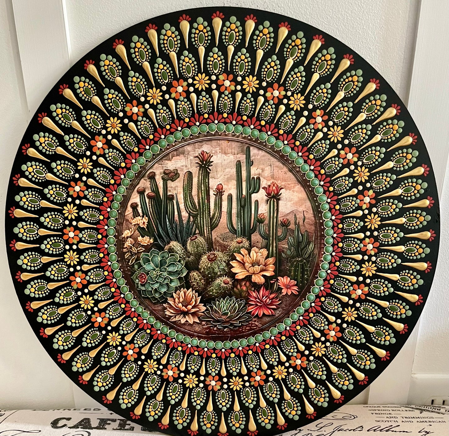 Hand painted cactus plaque on a 16 inch wood round.