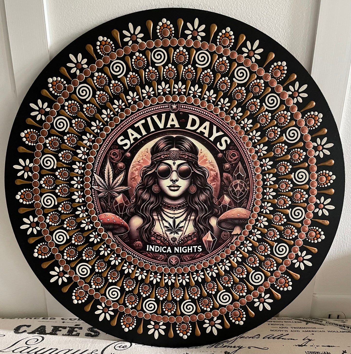 Hand painted sativa plaque on a 16 inch wood round ￼
