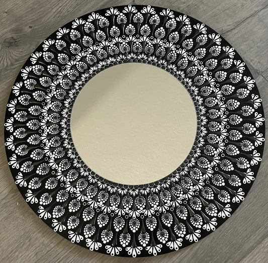 Hand painted black-and-white mirror plaque on a 16 inch wood round