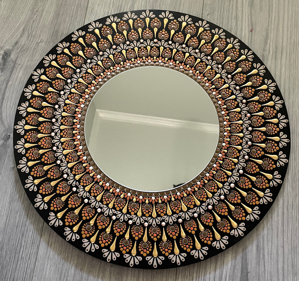 Hand painted mirror on a 16 inch wood round ￼