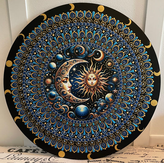 Handpainted sun and moon plaque on 16 inch wood round.