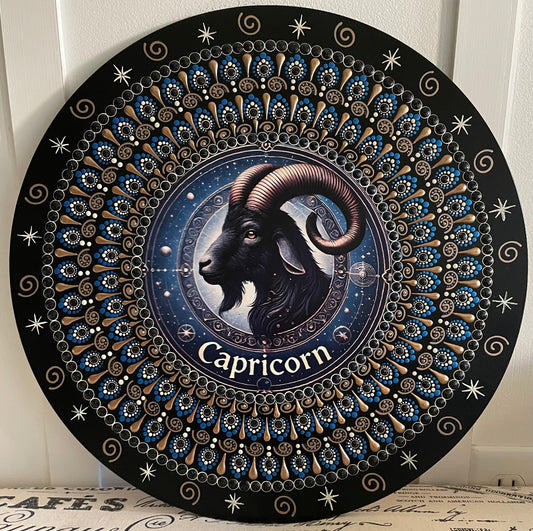 Hand painted Capricorn plaque on a 16 inch wood round