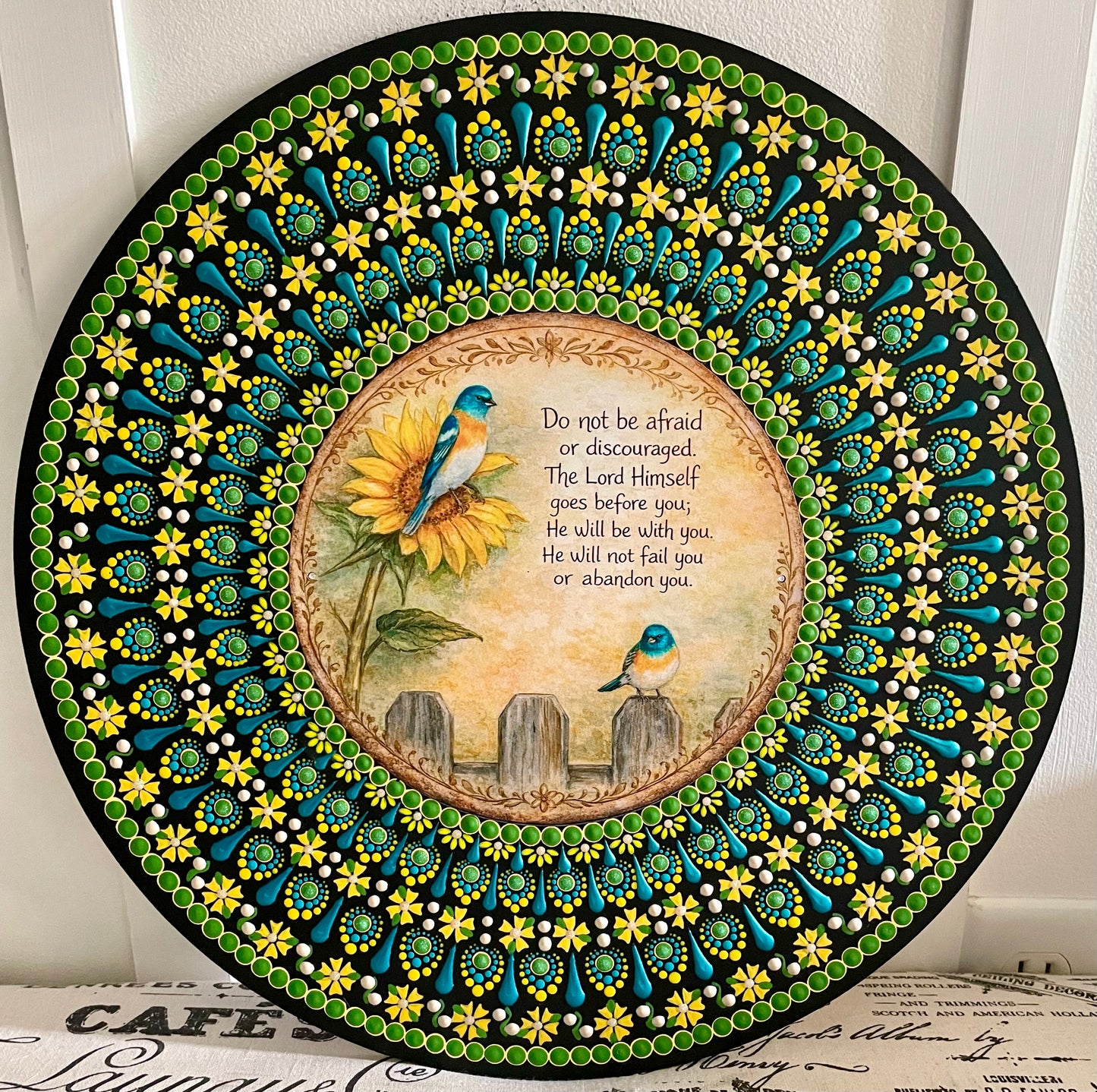 Handpainted flower and bird plaque on 16 inch wood round