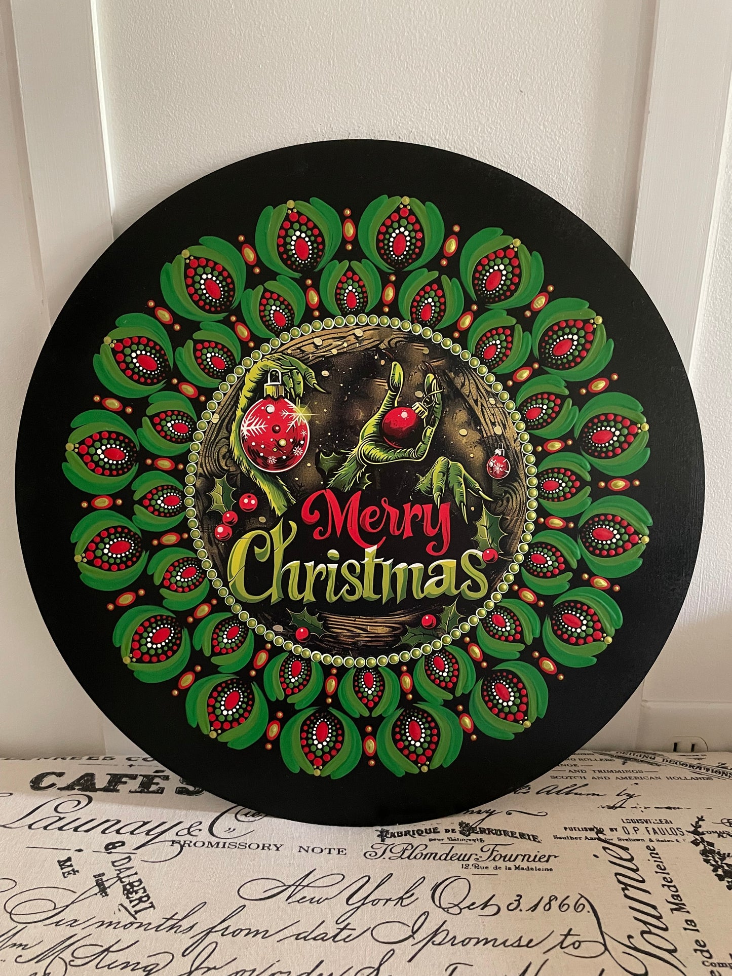 Handpainted Grinch wall plaque on 16 inch wood round